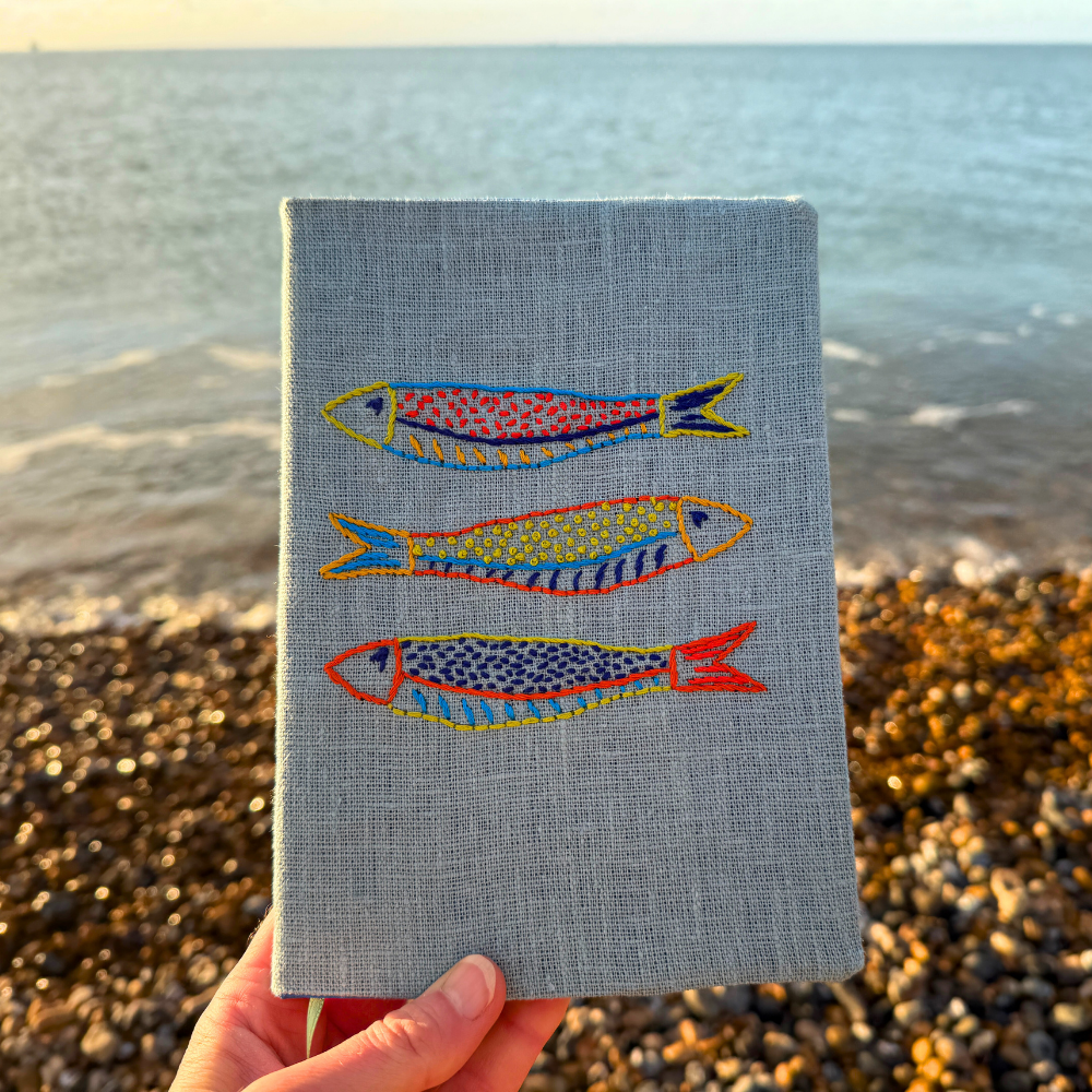 Hand-EmbroideredSardinesBookCover-FineCellWork.png