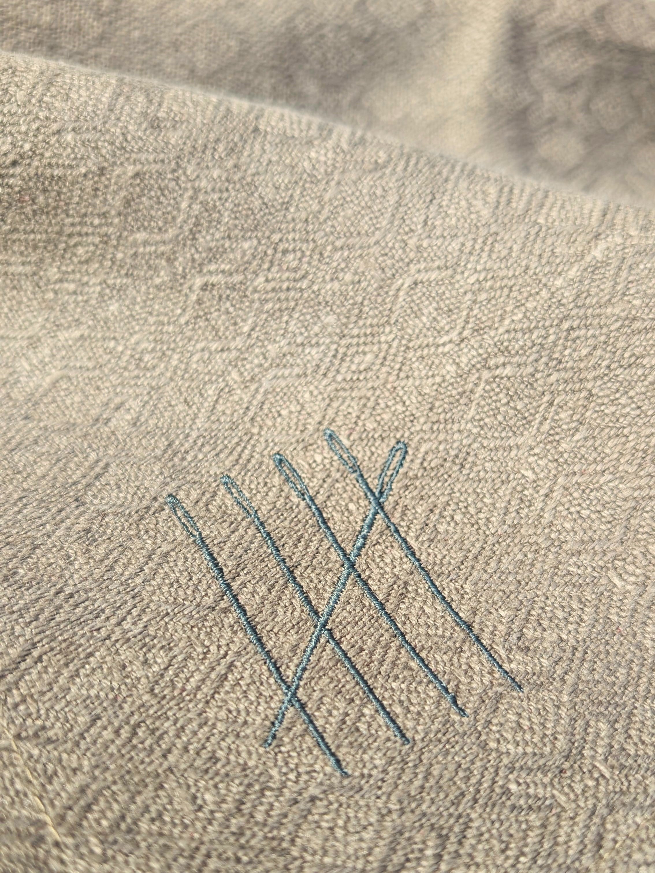 Utility_Range_Tea_Towel_-_Logo_detail_-_Fine_Cell_Work.jpg