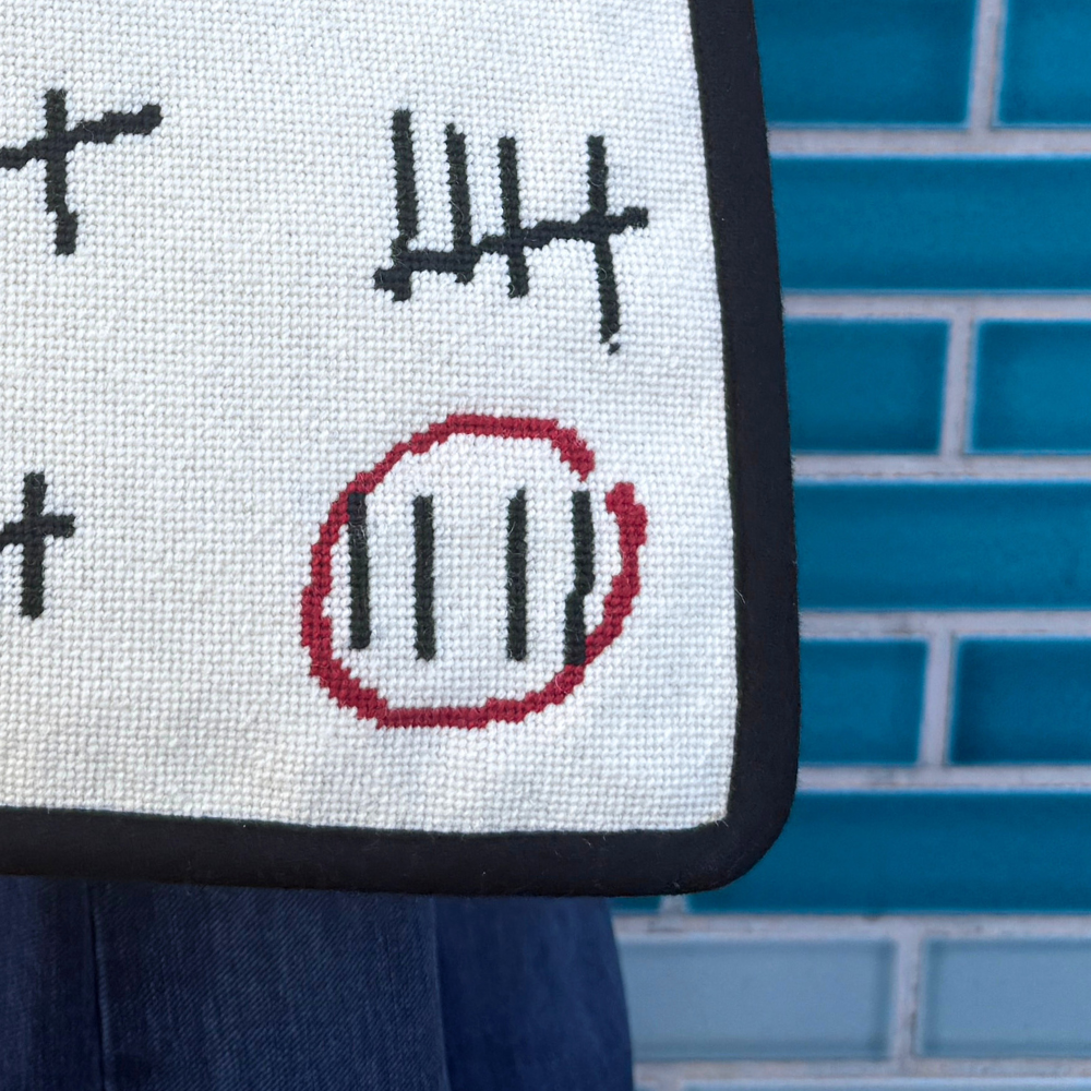 WhitePrisonCalendarNeedlepointToteBagbyA.A.Gill-FineCellWorkDetail_c6f25f44-2126-49e4-bae6-60b3f1a58b1f.png