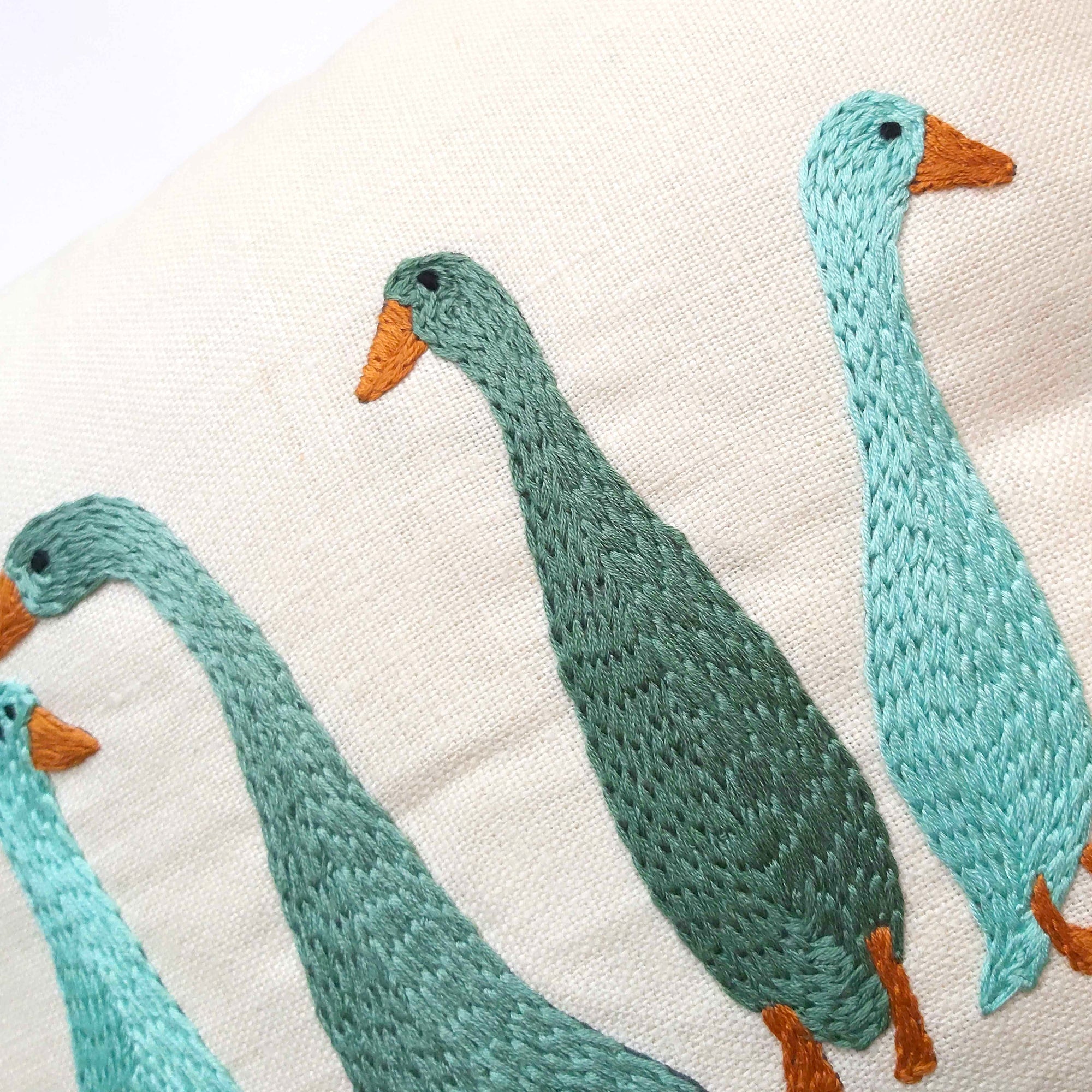 Ducks in a Row Embroidered Cushion Green