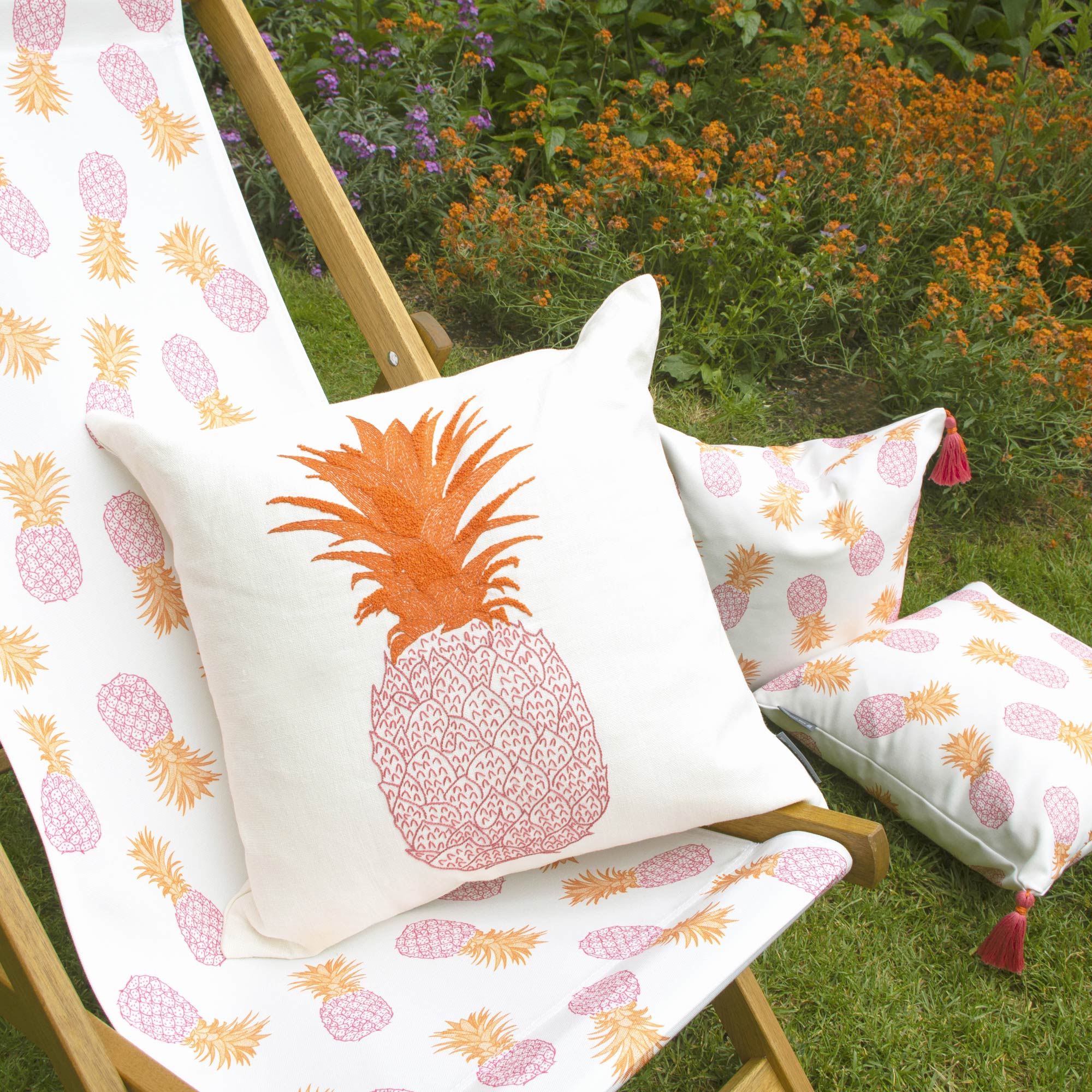 Pineapple Hand-Embroidered Cushion on Deckchair Pink and Orange on Cream Melissa Wyndham for Fine Cell Work