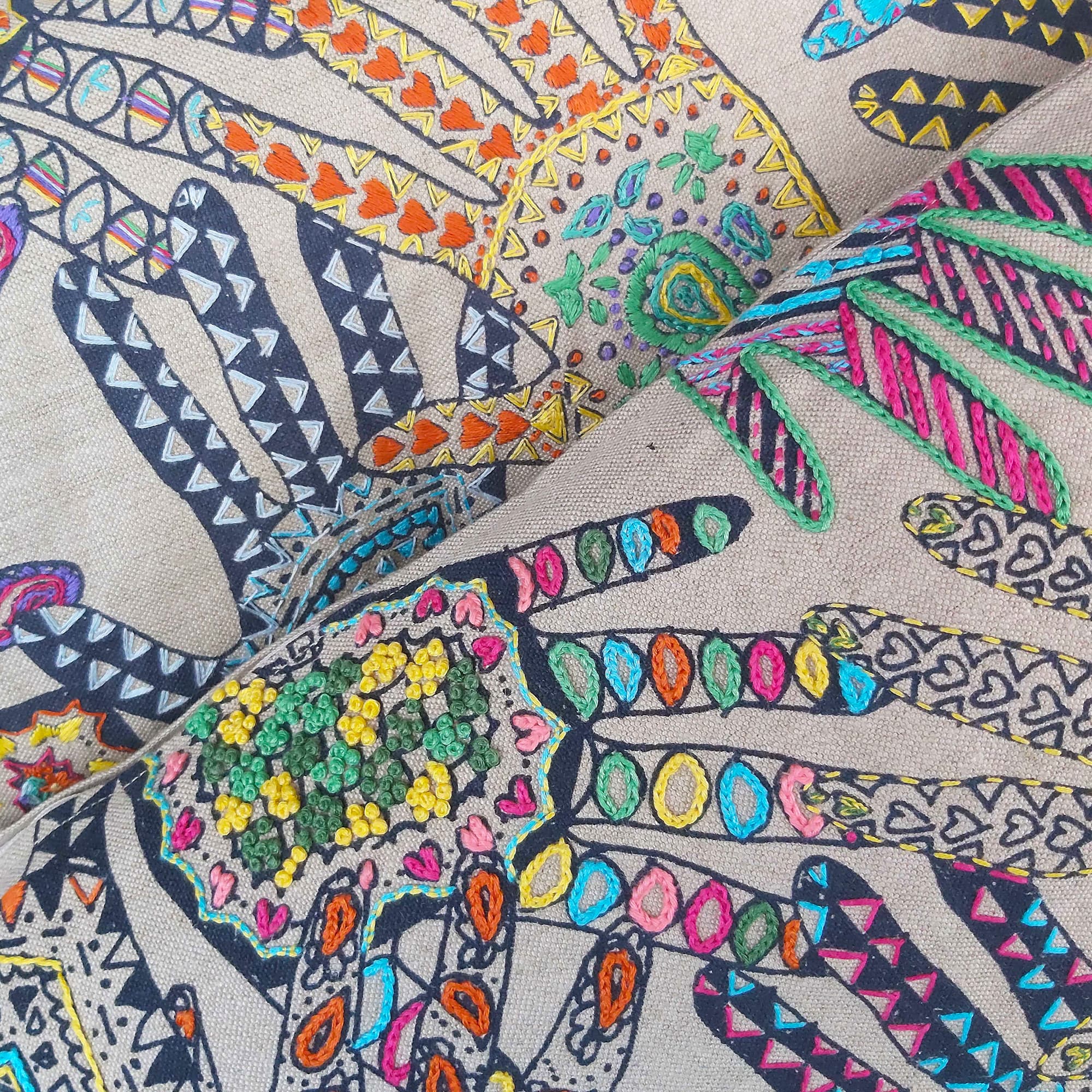 Hand-Embroidered-Hands-Cushion-Detail2-min.jpg